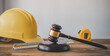 Judge's hammer and helmet Law and Justice about labor law concept Construction law.
