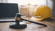 Leinwandbild Motiv Judge's hammer and helmet Law and Justice about labor law concept Construction law.