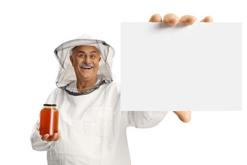 Wall Mural - Honey producer holding a jar and showing a blank card