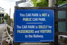 Blue Car Park Is Not A Public Car Park, Solely For Passengers And Visitors Sign At Bolton Abbey Railway Station, Yorkshire, UK