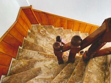 Marble Staircase In The Hotel. Many Steep Steps, A Sharp Turn On The Stairs Down. Natural Stone On The Stairs, Expensive Material, Smooth Texture