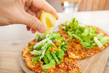 Lahmacun - is a traditional turkish cuisine - baked in oven pita bread with minced meat and spices. This dish is included in unesco intangible heritage