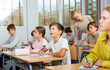 © JackF - Portrait of surprised teenage schoolboy, sitting at desk during lesson in classroom