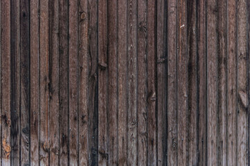 Sticker - Old plank wooden wall background. The texture of old wood. Weathered piece of wood.