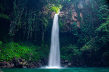 Waterfall Scenery Background Surrounded By Greenery In The Forest