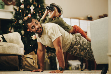 Wall Mural - Happy military dad spending quality time with his son