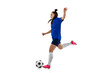 One sportive girl, female soccer, football player training isolated on white studio background. Sport, action, motion, fitness concept