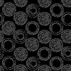  Seamless contrast texture of hand-drawn abstract circles from broken lines, dashes on a black square background