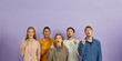 © Studio Romantic - Group of different mixed race multiethnic people struck by amazing idea and bright solution standing on color background and pointing index fingers up with open mouths and surprised facial expressions