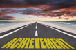 © Jay Koppelman - Achievement word for goal concept on the path to success.