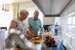 © pikselstock - Senior couple in a kitchen making breakfast