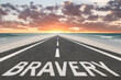 © Jay Koppelman - Bravery word written on a highway for the concept of courage on your journey.