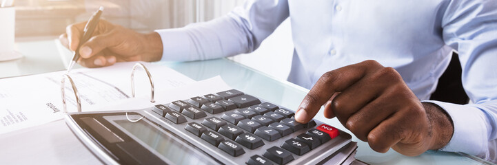 Poster - Businessman Calculating Invoice