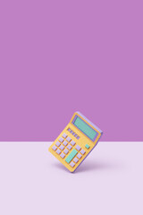 Colorful papermade old calculator in studio