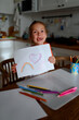 © Tatiana Timofeeva/Stocksy - girl draw at home