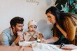 © Melissa Milis Photography/Stocksy - Birthday celebration for a one year old baby