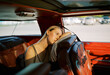 © Alexey Kuzma/Stocksy - Young woman in the car