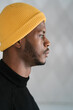 © Ezequiel Giménez/Stocksy - Stylish black man in hat