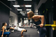 © Pedro Merino/Stocksy - Strong woman training at the gym