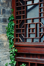 Traditional Chinese Architecture Covered With Creeper Leaves