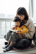 © ZQZ Studio/Stocksy - Asian mother and daughter