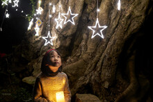 Closeup Chinese Little Girl Under The Star Lights
