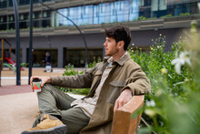 City Man Relaxing With Coffee At Public Place