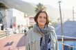 © Juno/Stocksy - Smiling street outdoor portrait