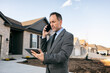 © Sean Locke/Stocksy - Real Estate Agent In Phone Discussion