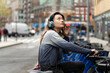 © Lauren Lee/Stocksy - Woman on public bike