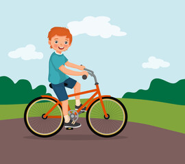 Poster - happy little boy riding a bike having fun in the park on sunny day 