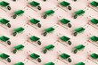 © Giada Canu/Stocksy - pattern of many green rake and wheelbarrows