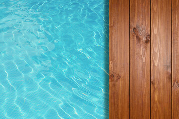 Wall Mural - Empty wooden surface near swimming pool with clear water. Space for design