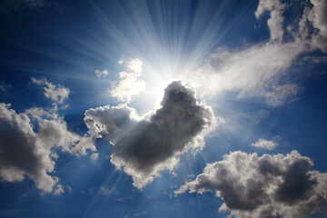 Wall Mural - sun rays on dramatic sky