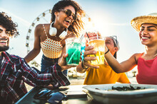 Diverse Young People Celebrating Cheering Cocktail Glasses Outside - Happy Group Of Friends Having Fun Together On Summer Vacation - Friendship Concept With Guys And Girls Enjoying Weekend Event