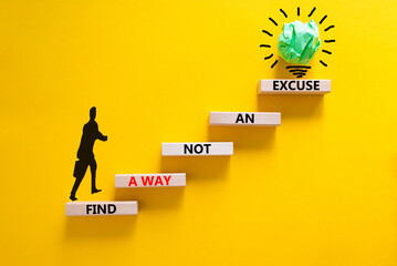 Find a way not excuse symbol. Concept words Find a way not an excuse on wooden blocks on a beautiful yellow table yellow background. Businessman icon. Business motivational and not excuse concept.