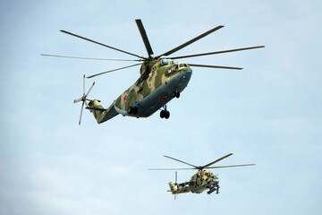 Military helicopters Mi-26 and Mi-24 over Moscow during the dress rehearsal of the parade dedicated to the 77th anniversary of Victory in the Great Patriotic War