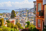 Fototapeta  - Stunning view of homes in San Francisco with steep hills showcasing distance