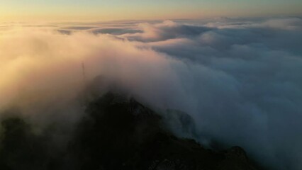 Wall Mural - mountain top above the sunset and clouds. Ceahlau, Romania