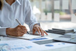 © crizzystudio - The professional investor, businesswoman Executives are working and analyzing project statistics result in report investment and planning strategic marketing, financial and accounting concept