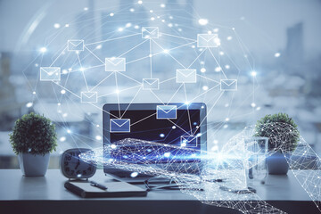 Poster - Desktop computer background in office and flying envelops hologram drawing. Double exposure. Electronic mail concept.