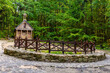 Traditional forest shrine and spring of St. Francis in Swieta Katarzyna village near Bodzentyn at tourist path to Lysica peak in Swietokrzyskie Mountains in Poland