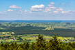 Panorama of Gory Swietokrzyskie Mountains and valleys with Starachowice and Kielce region villages seen from Swiety Krzyz mount hilltop near Nowa Slupia village in Poland