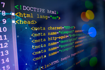 Leinwandbilder - HTML code on computer monitor and server room background.
