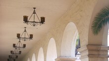 Spanish Colonial Revival Architecture, Balboa Park, San Diego, California USA. Historic Building, Classic Baroque Or Rococo Romance Style. Arches And Columns Of Casa, Archway, Vault, Arcade Or Passage