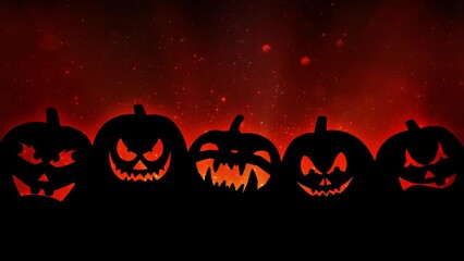 Wall Mural - Jack O Lantern Silhouette on Orange 4K Loop features the silhouette of five Jack O Lanterns with and orange particle background in a loop