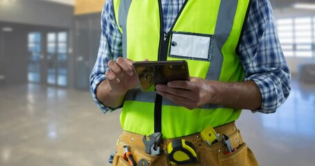 Poster - Animation of labor day text over caucasian male worker with tablet