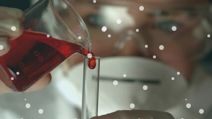 Poster - Animation of dots floating over caucasian female lab worker pouring liquid into glasses