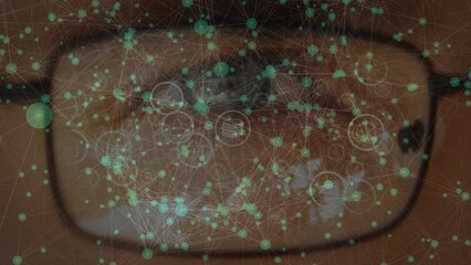 Poster - Animation of connections and icons over eye of caucasian man in glasses