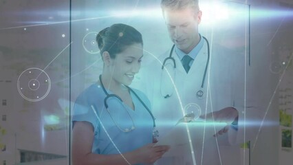 Poster - Network of connections over caucasian male doctor and female health worker discussing reports